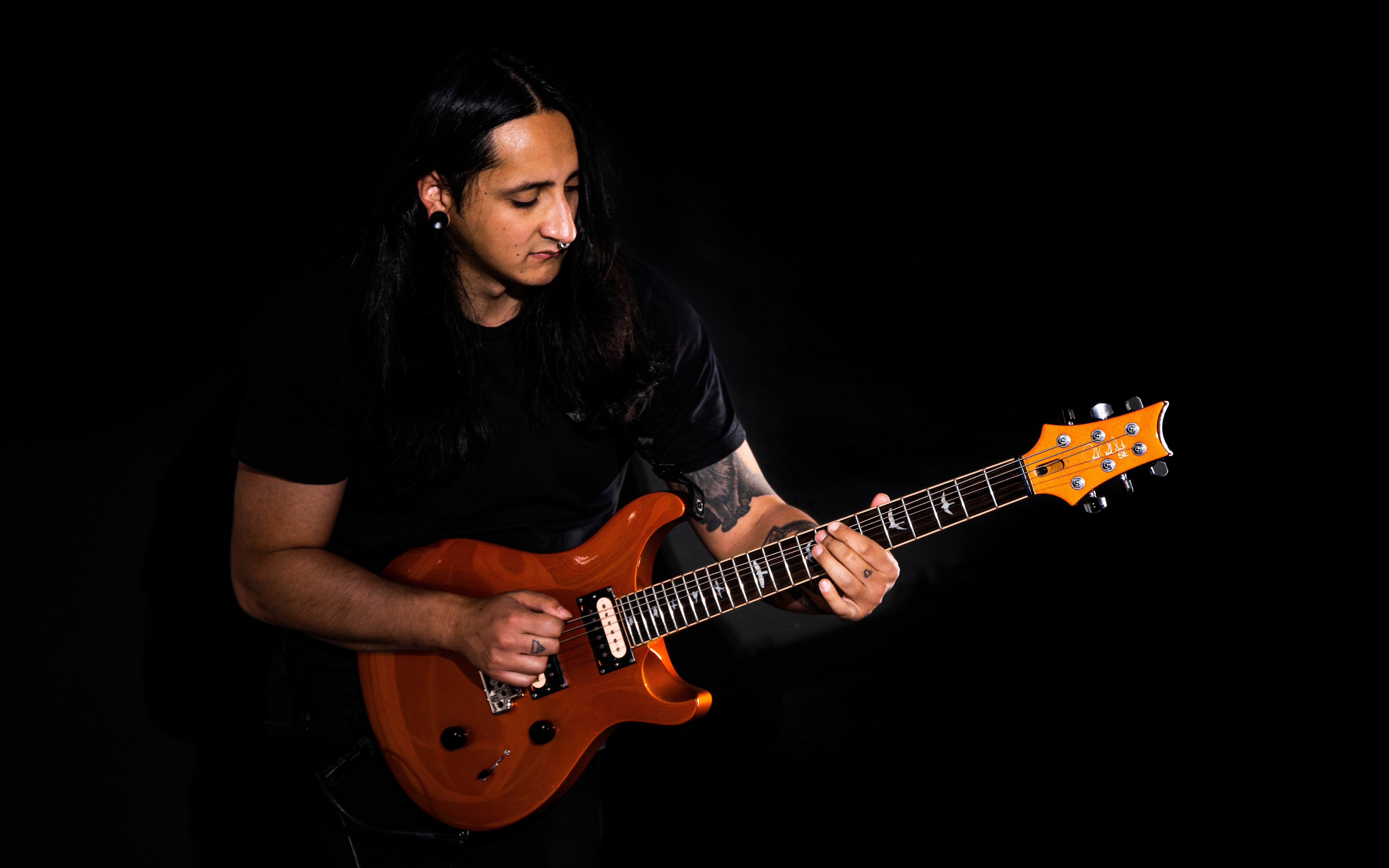 Cris Labbé with his PRS guitars